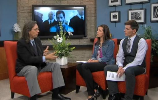 Image shows Chuck speaking with hosts Heather Roberts and Matt Metcalf on television program ciLiving.